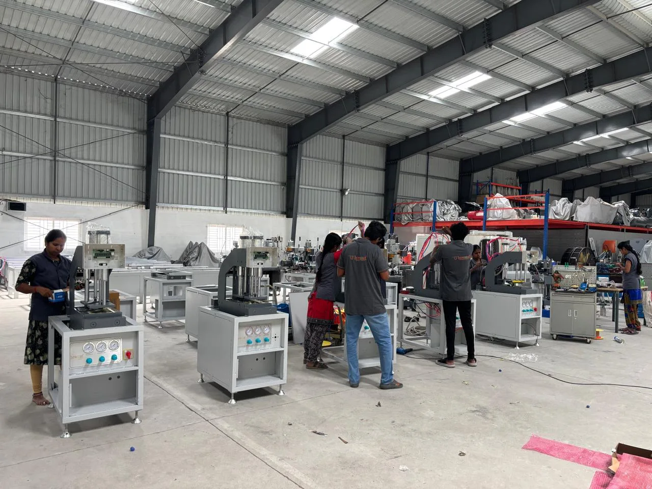 About Howzzat Impex 3 Production floor at Howzzat Impex UPVC machine factory, Pollachi